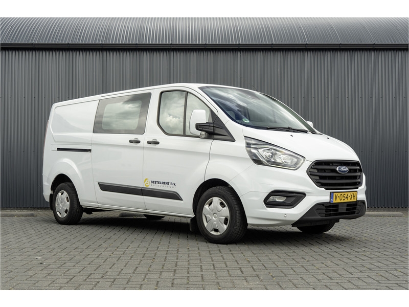 Ford Transit Custom **2.0 TDCI 131PK L2H1 | 6-Zits | Cruise | Airco | PDC | Euro 6**  Ford Transit Custom **2.0 TDCI 131PK L2H1 | 6-Zits | Cruise | Airco | PDC | Euro 6**